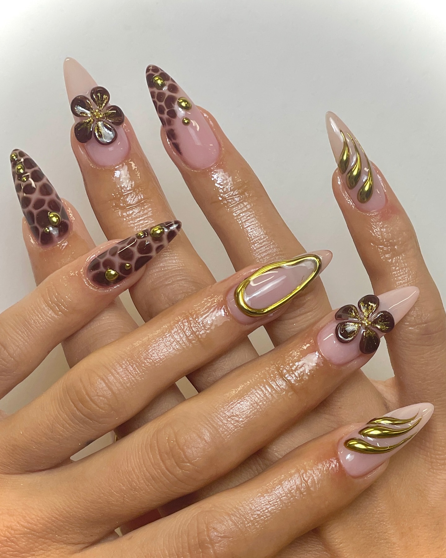 brown and gold 3d nails