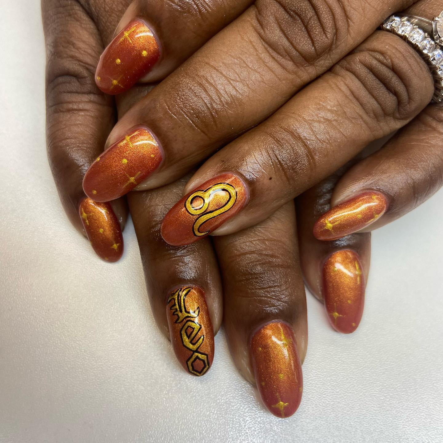 copper leo birthday nails