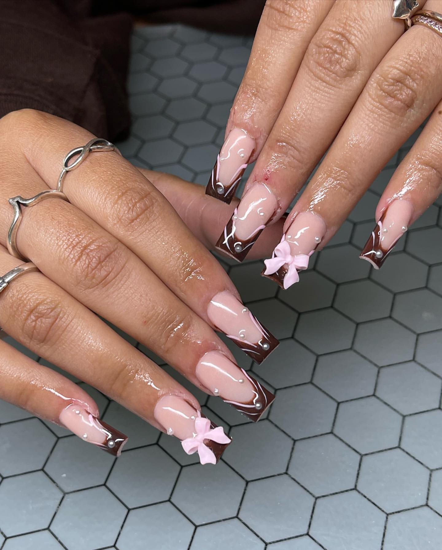 brown coquette nails