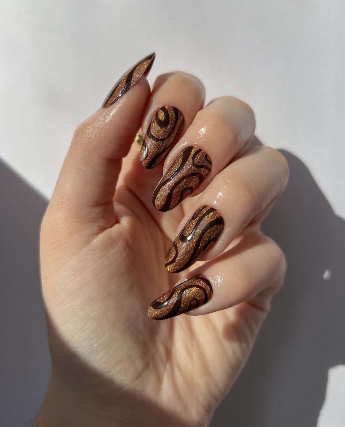 Shiny Brown Fall Almond Nails