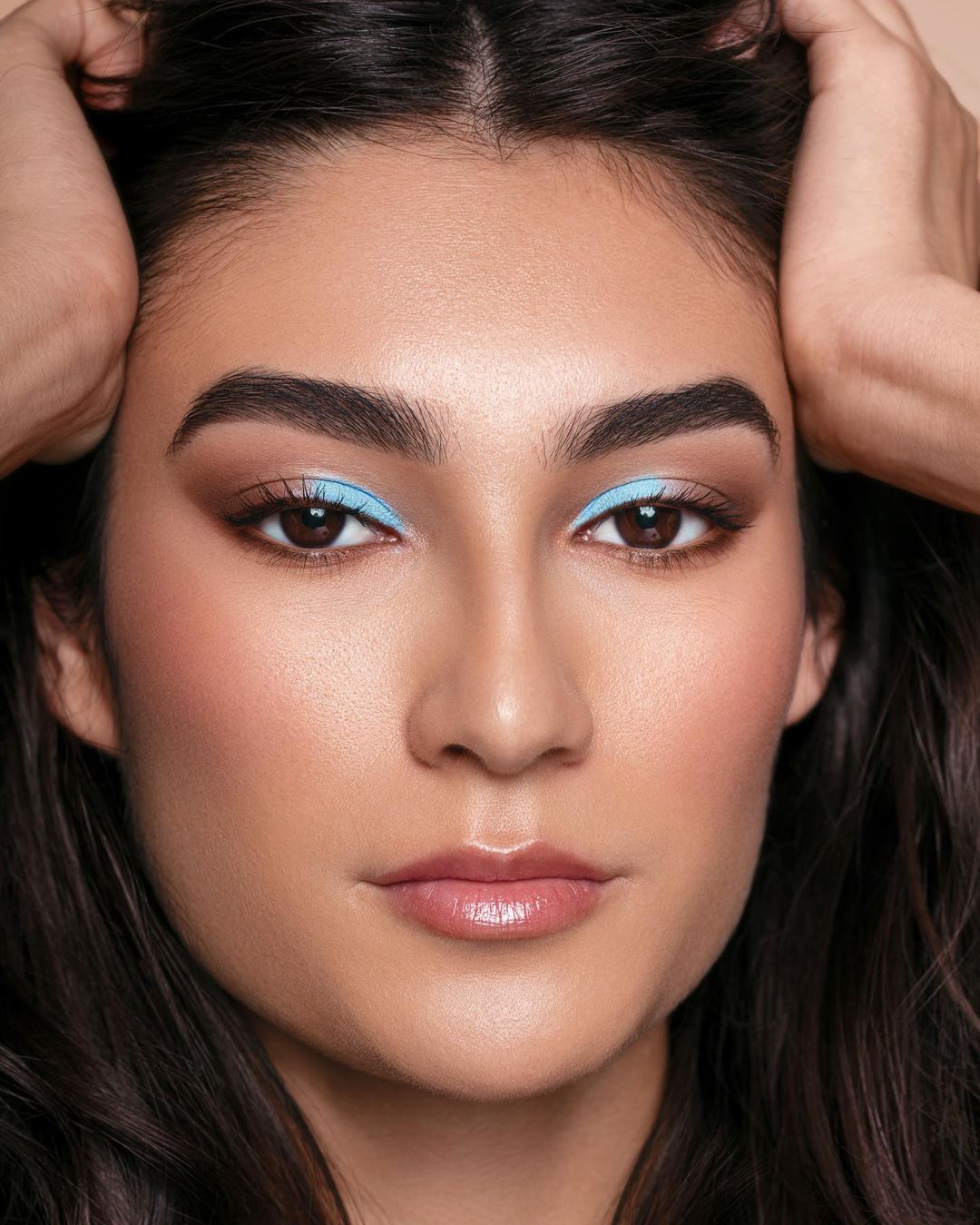 blue eyeshadow makeup look for brown eyes