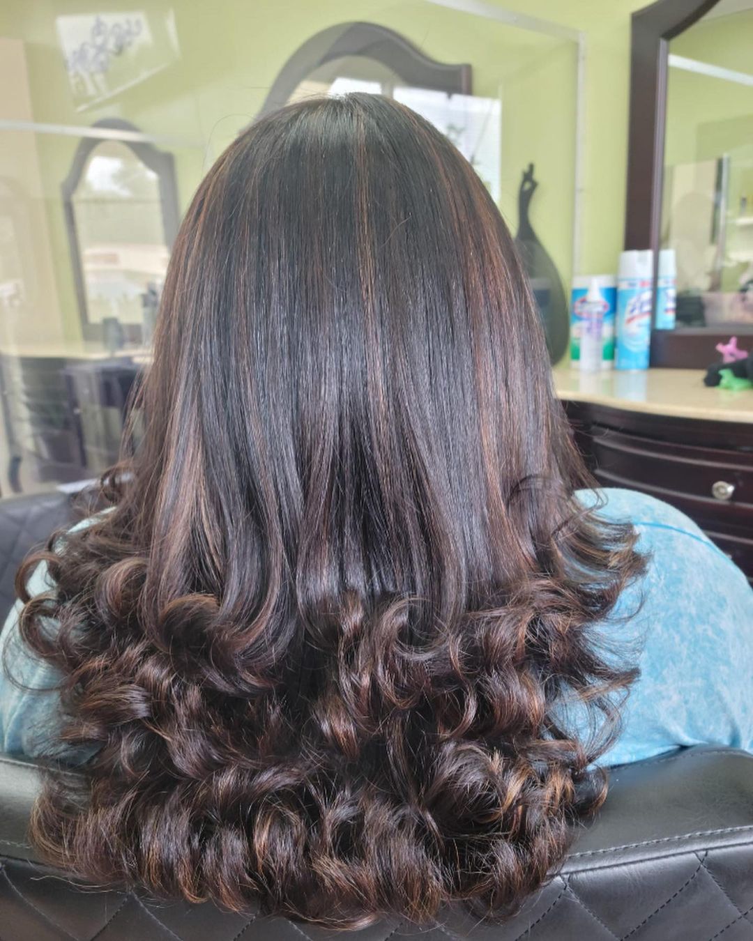 dark caramel balayage on curly layers