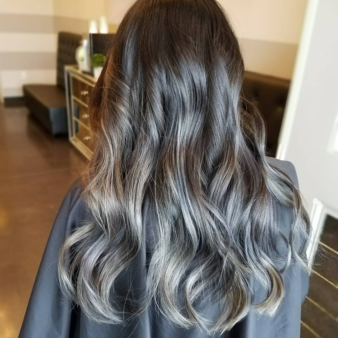 silver foilayage on dark brown hair