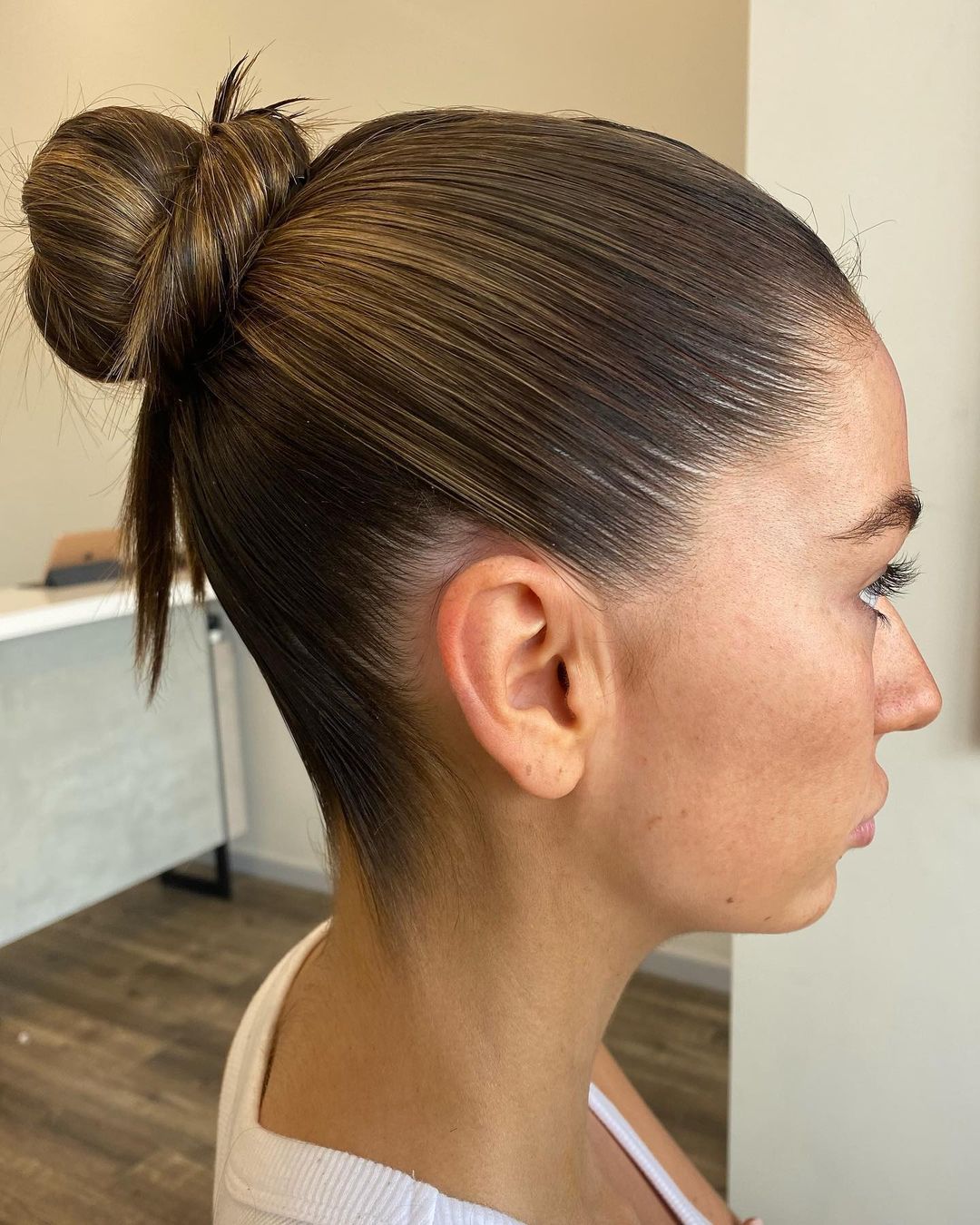 sleek high bun cute sporty hairstyle