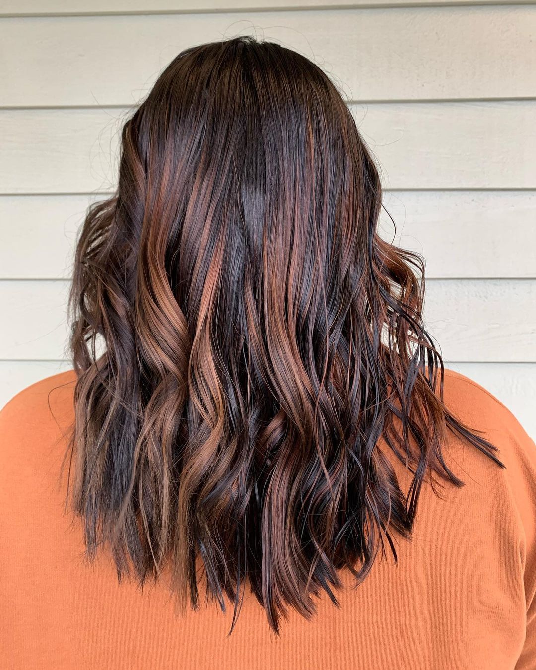 vibrant dark caramel balayage highlights