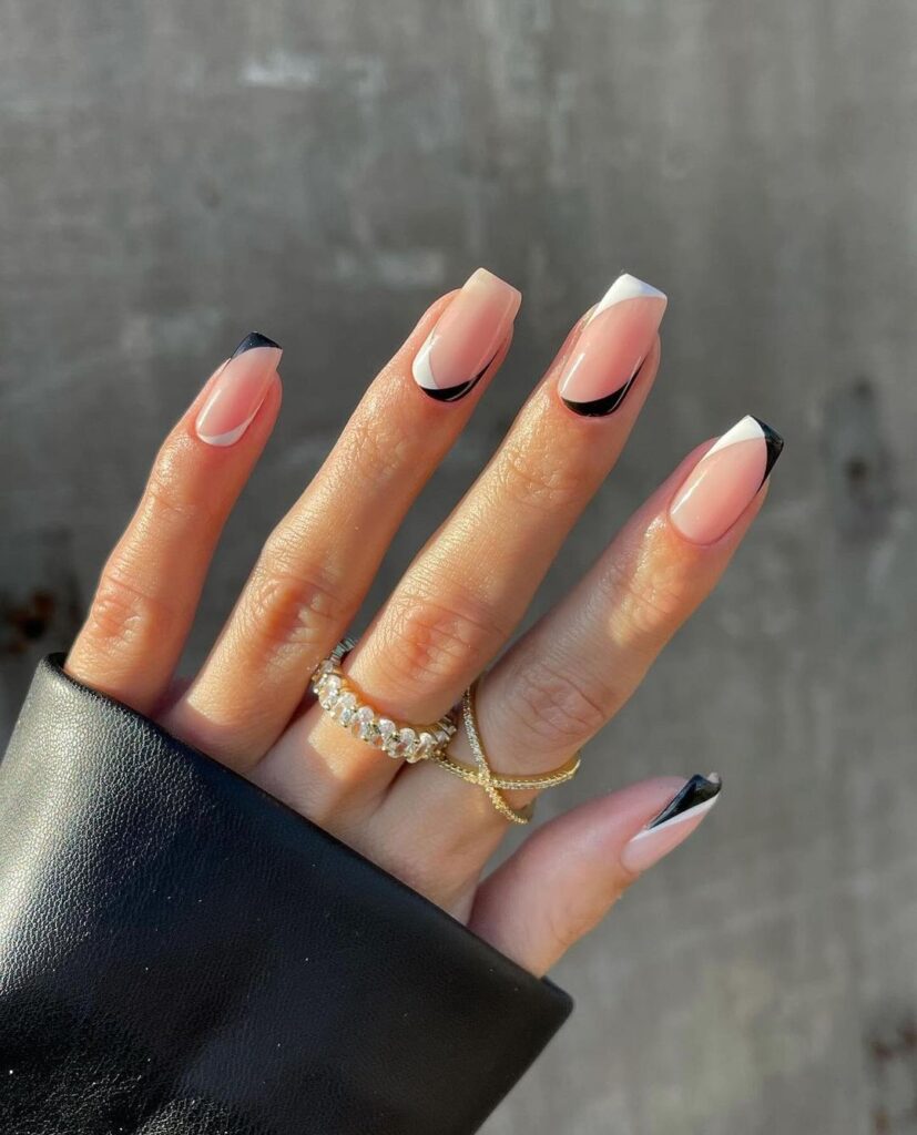 manicura de transición del verano al otoño en blanco y negro