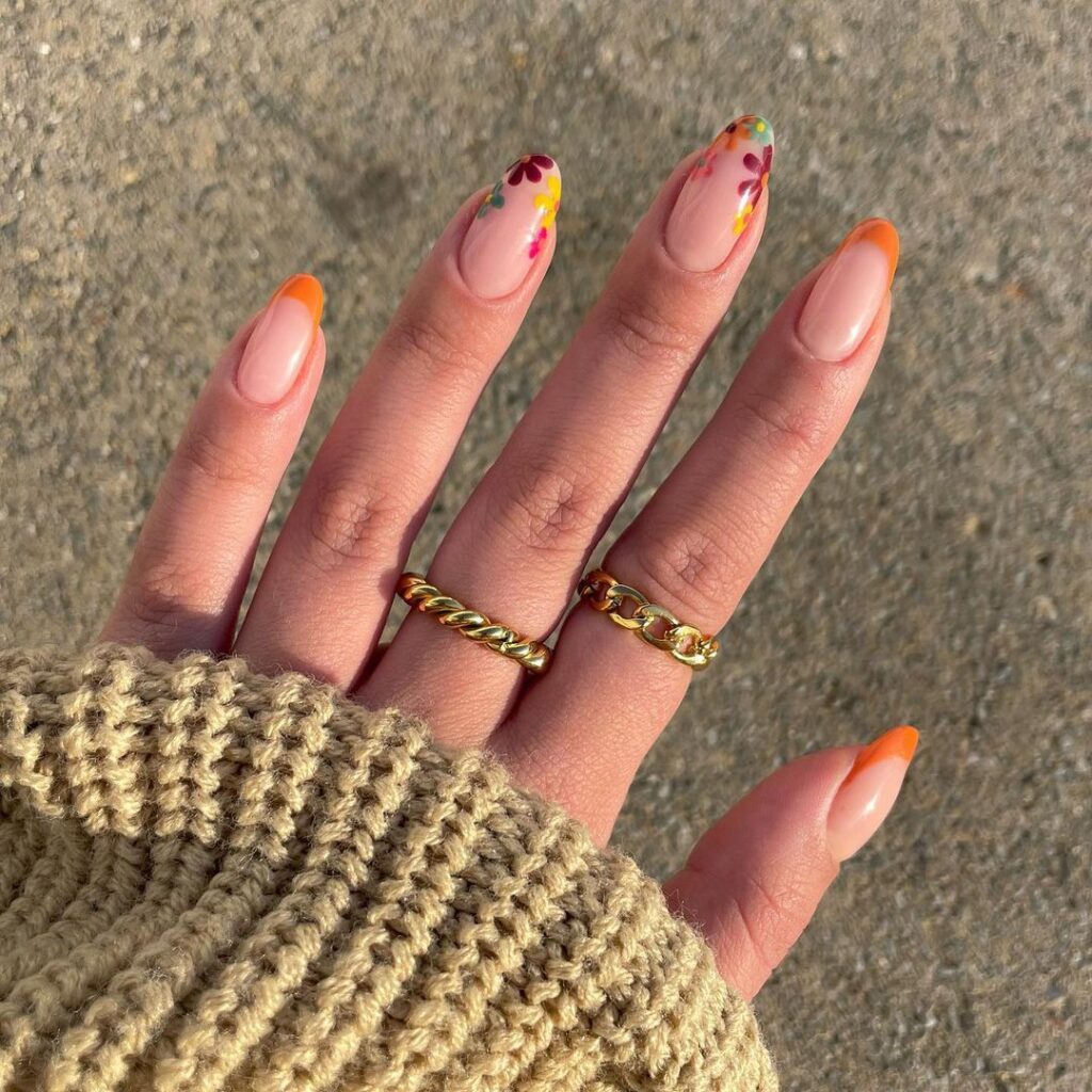 unhas floridas cor de laranja