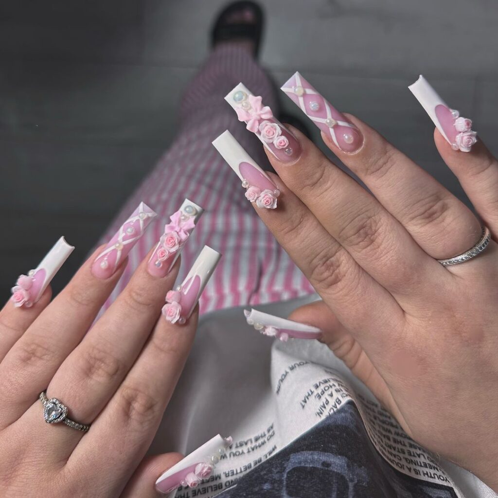 white junk nails with bows and flowers