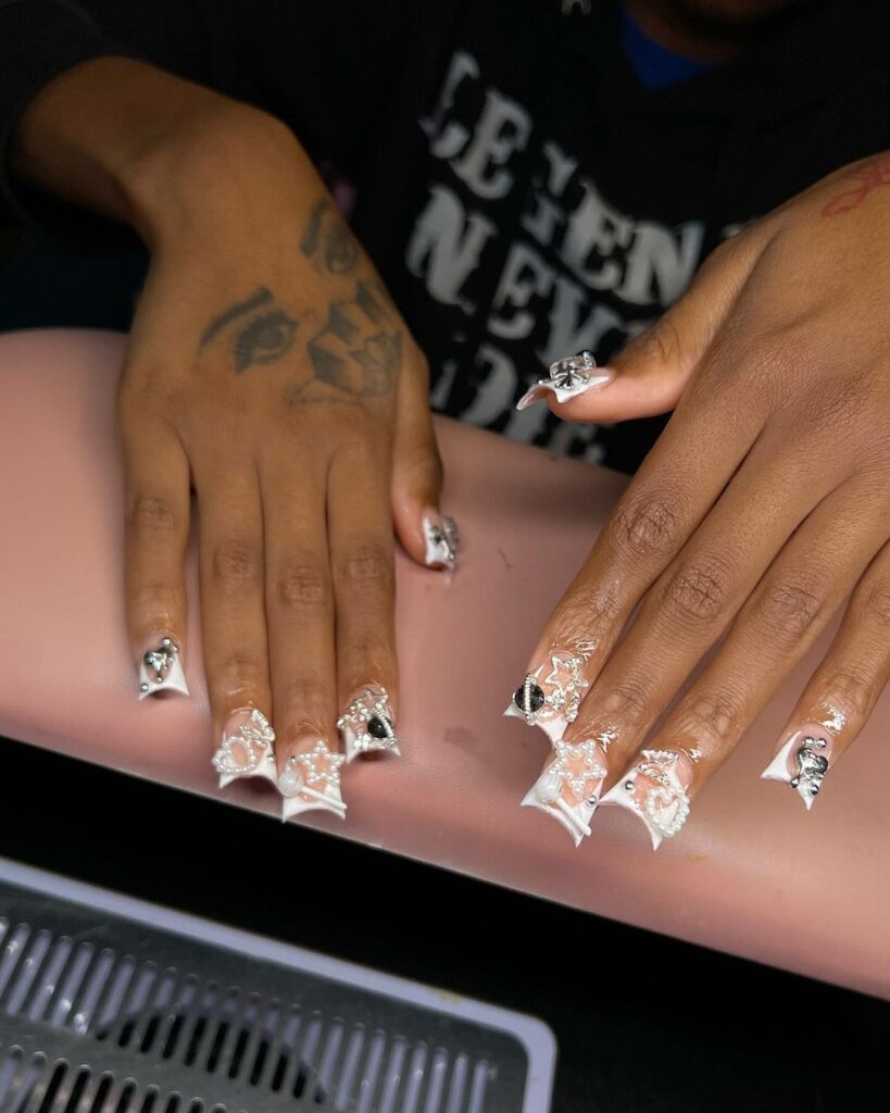 white junk nails with jewelry