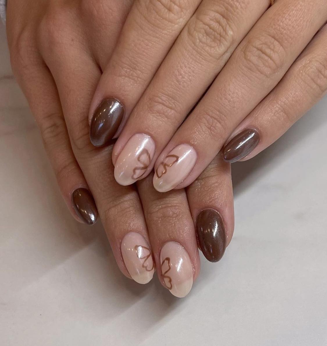 Brown Chrome Nails With Butterfly