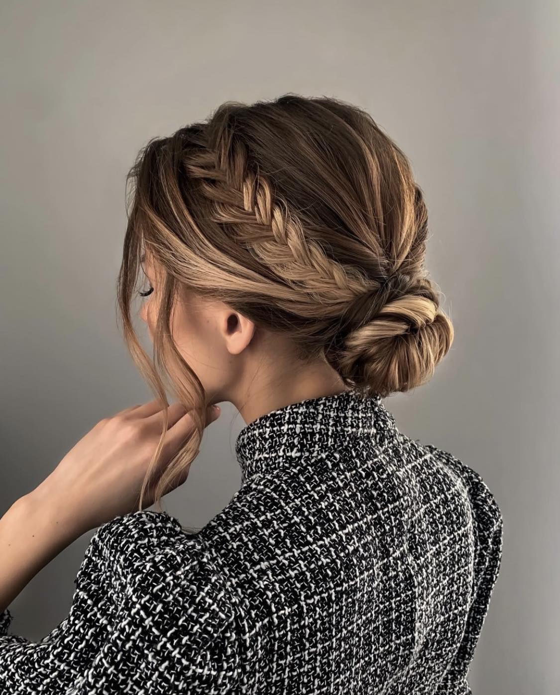 Coiffure en chignon tressé bas