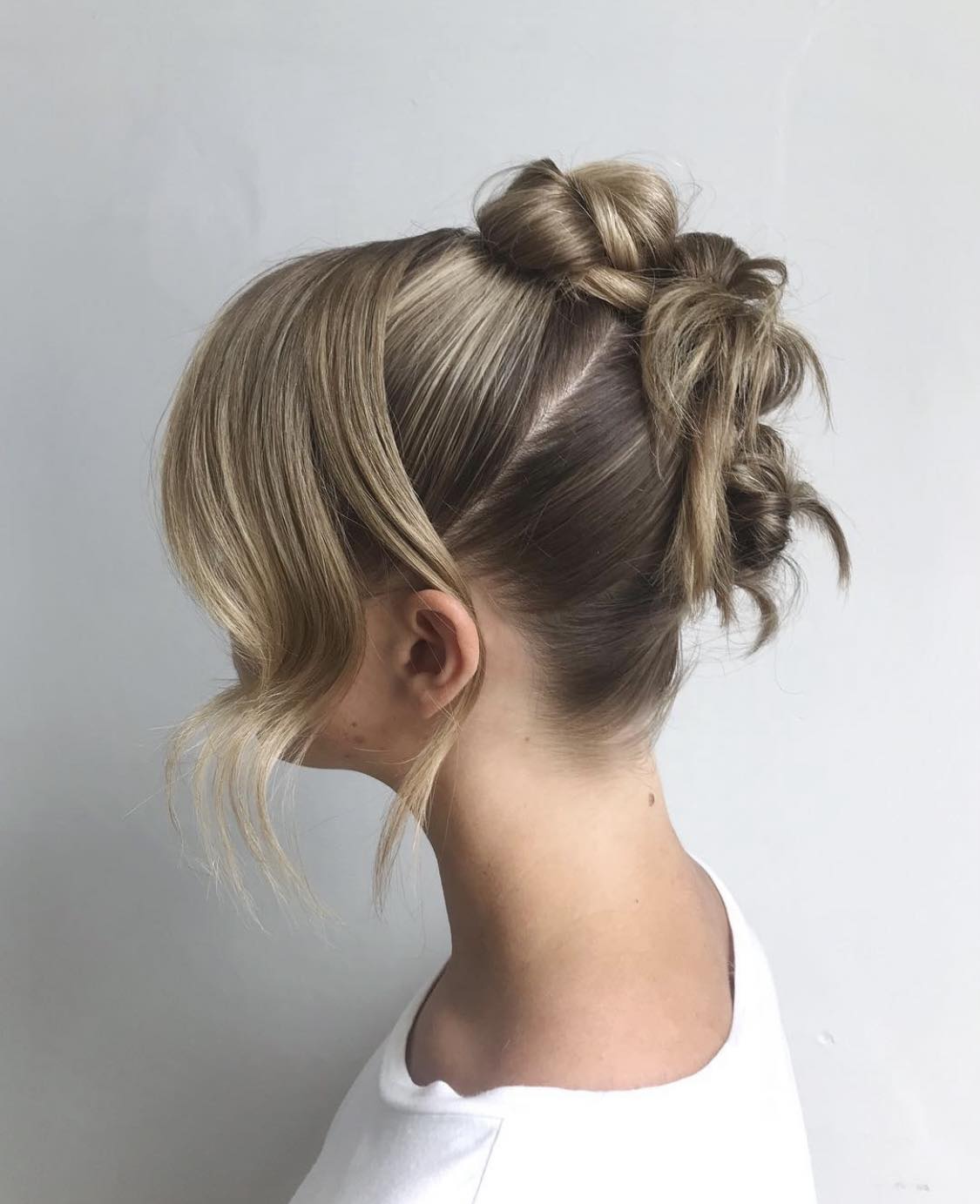 Three Buns Updo Hoco Hairstyle