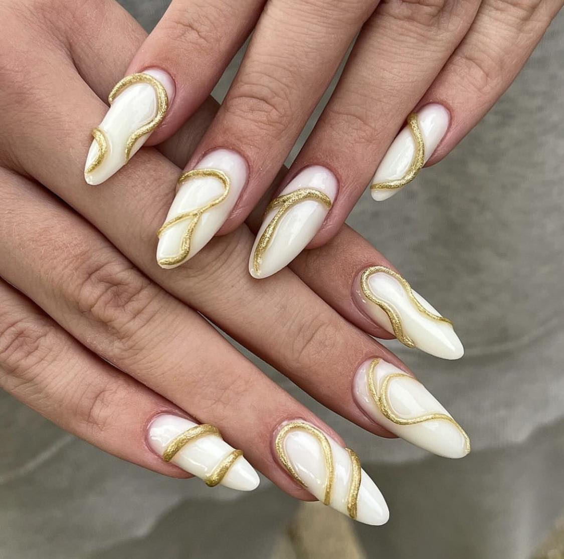 3D Almond White And Gold Nails