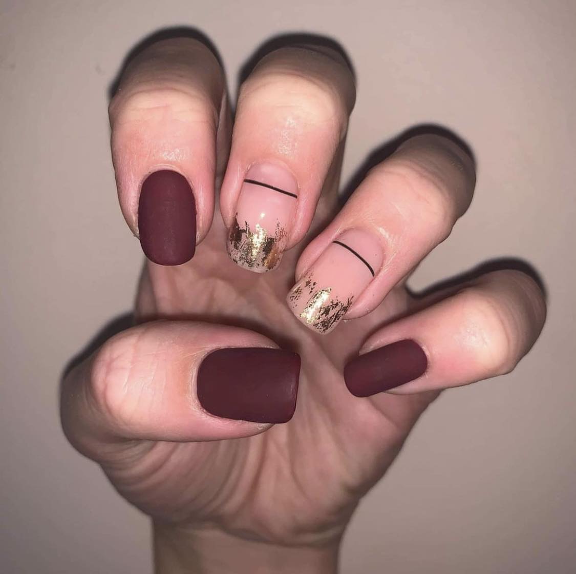 Burgundy Gold Nails