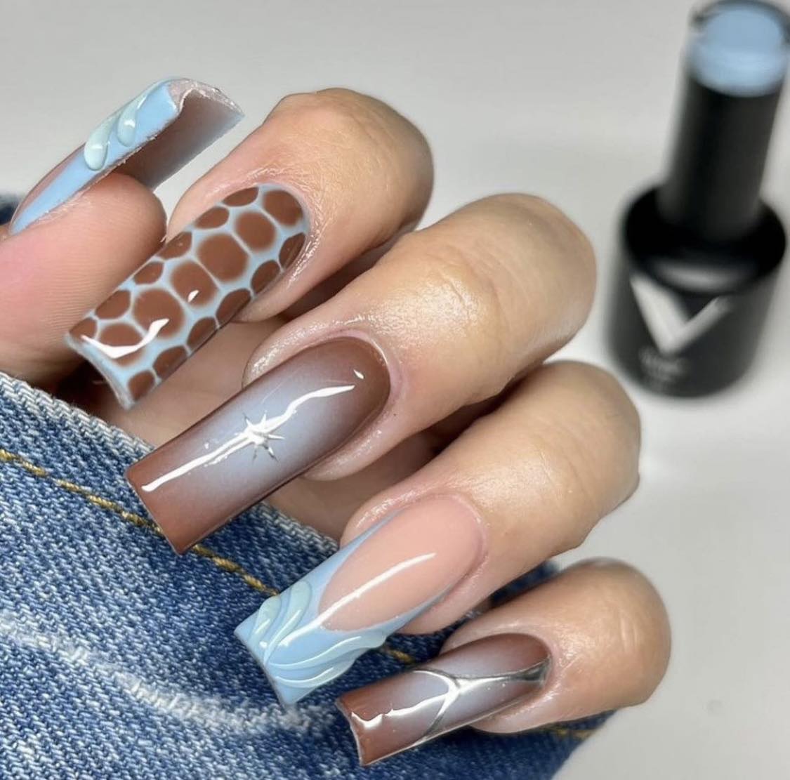 Brown And Light Blue Nails