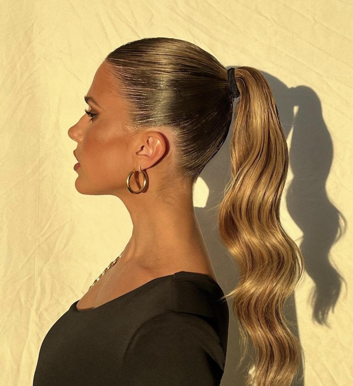 Wavy Slick Back Ponytail