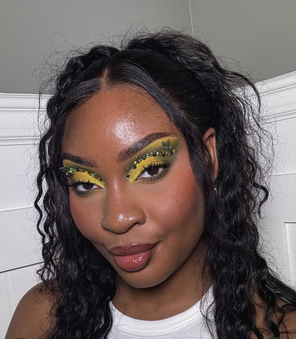 Emerald Green And Yellow Makeup Look With Rhinestones