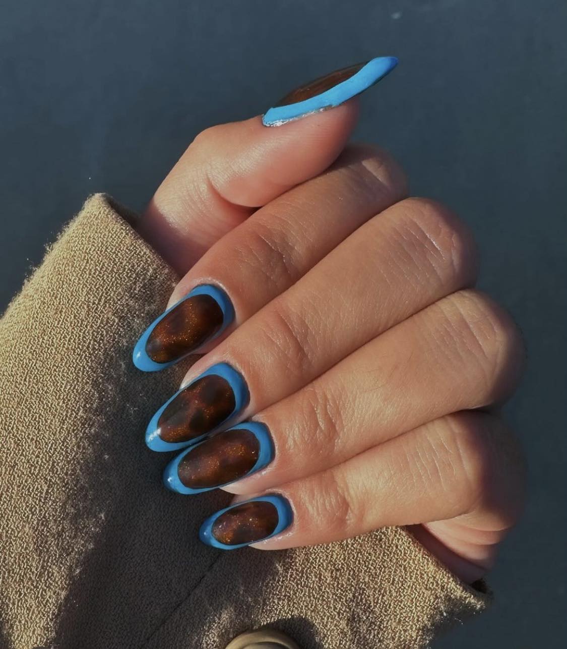 Shiny Blue And Tortoise Nails