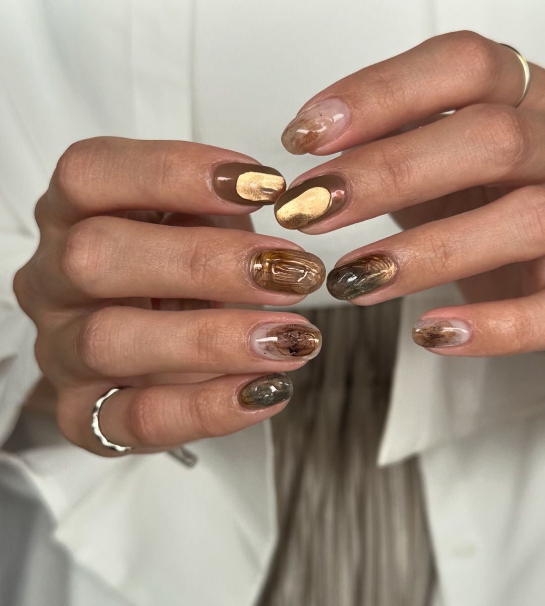 abstract maximalist brown nails