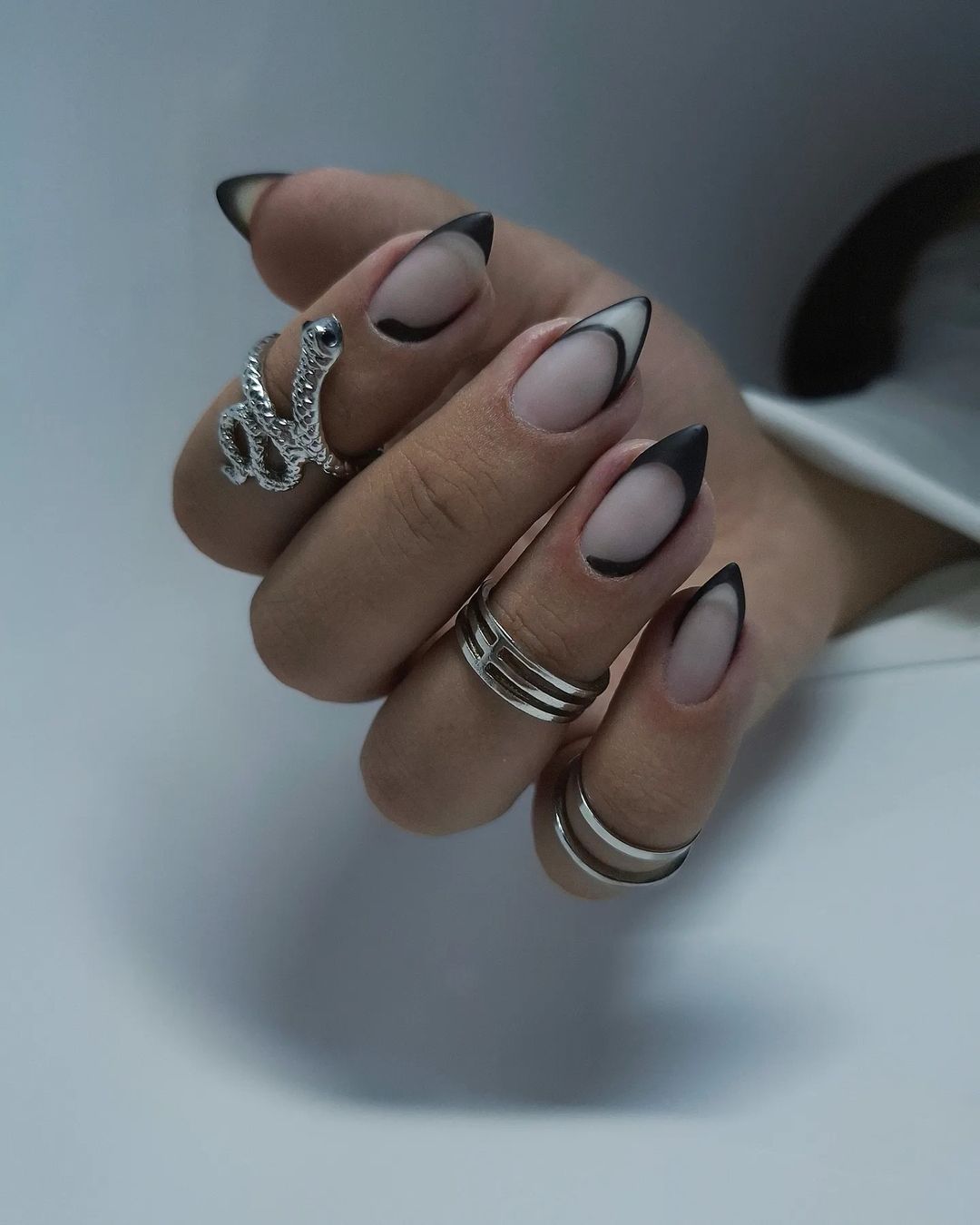 asymmetrical black french tip nails