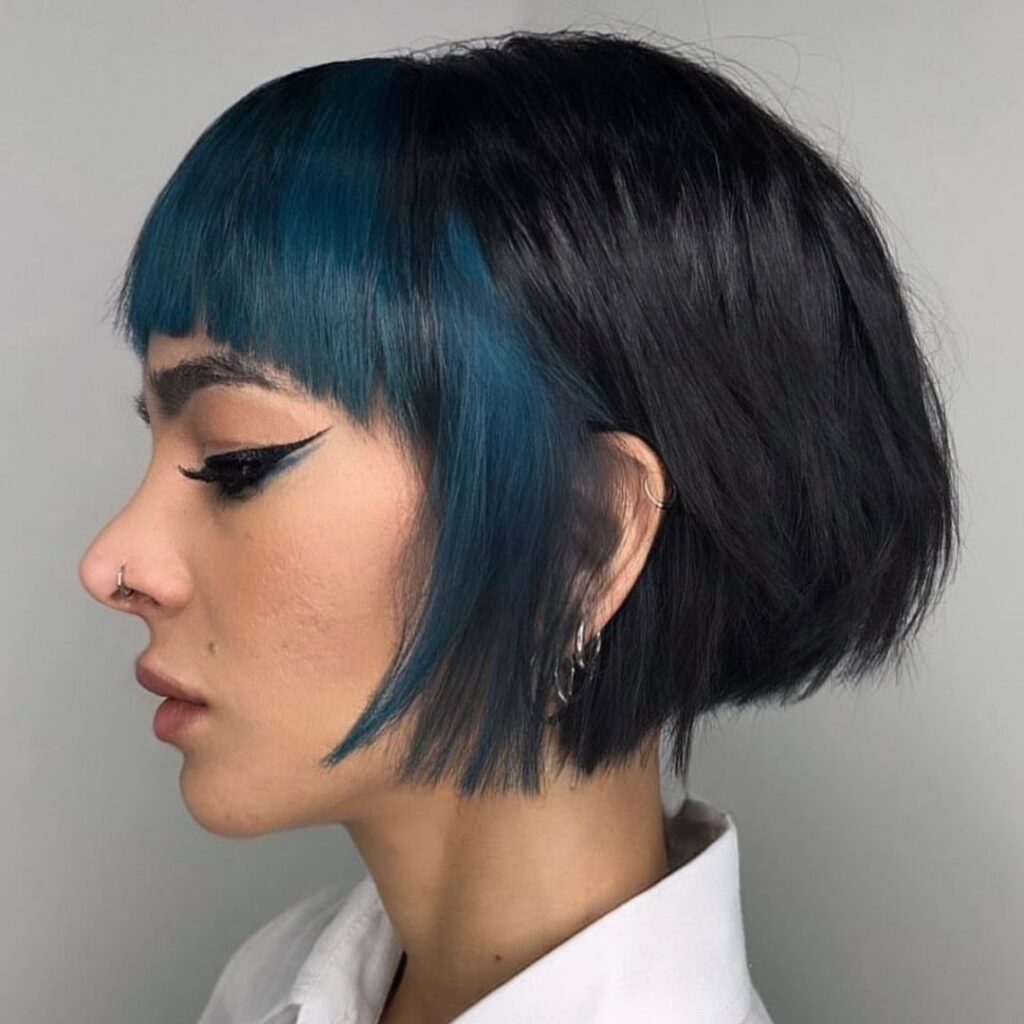 blue face framing bob with bangs