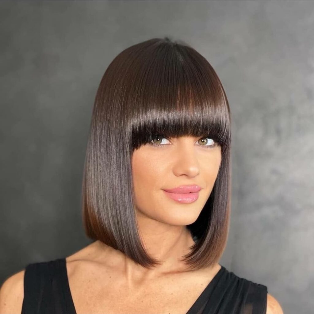 blunt haircut with sleek bangs