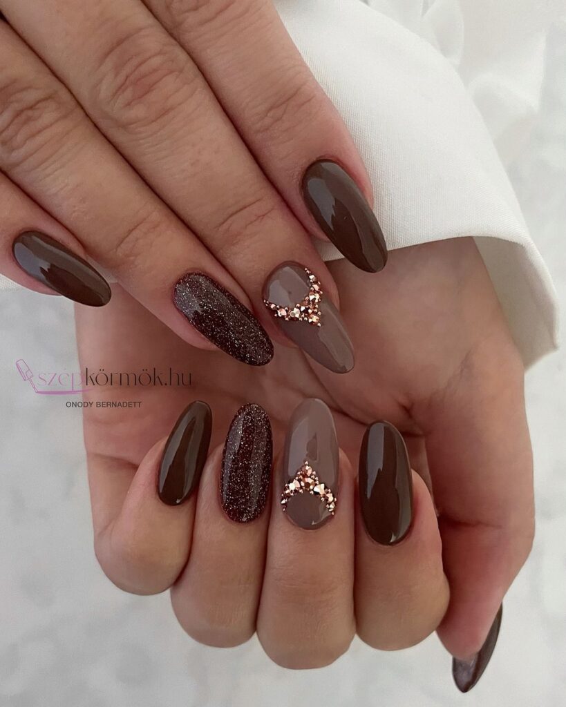 brown and gold oval-shaped nails