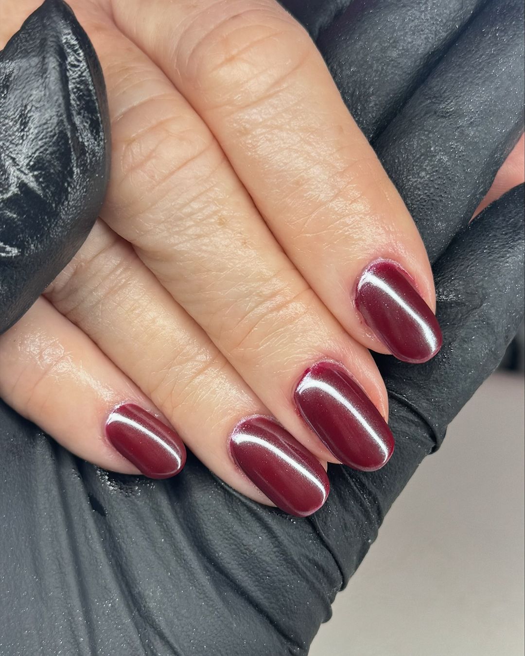 dark glossy maroon chrome nails