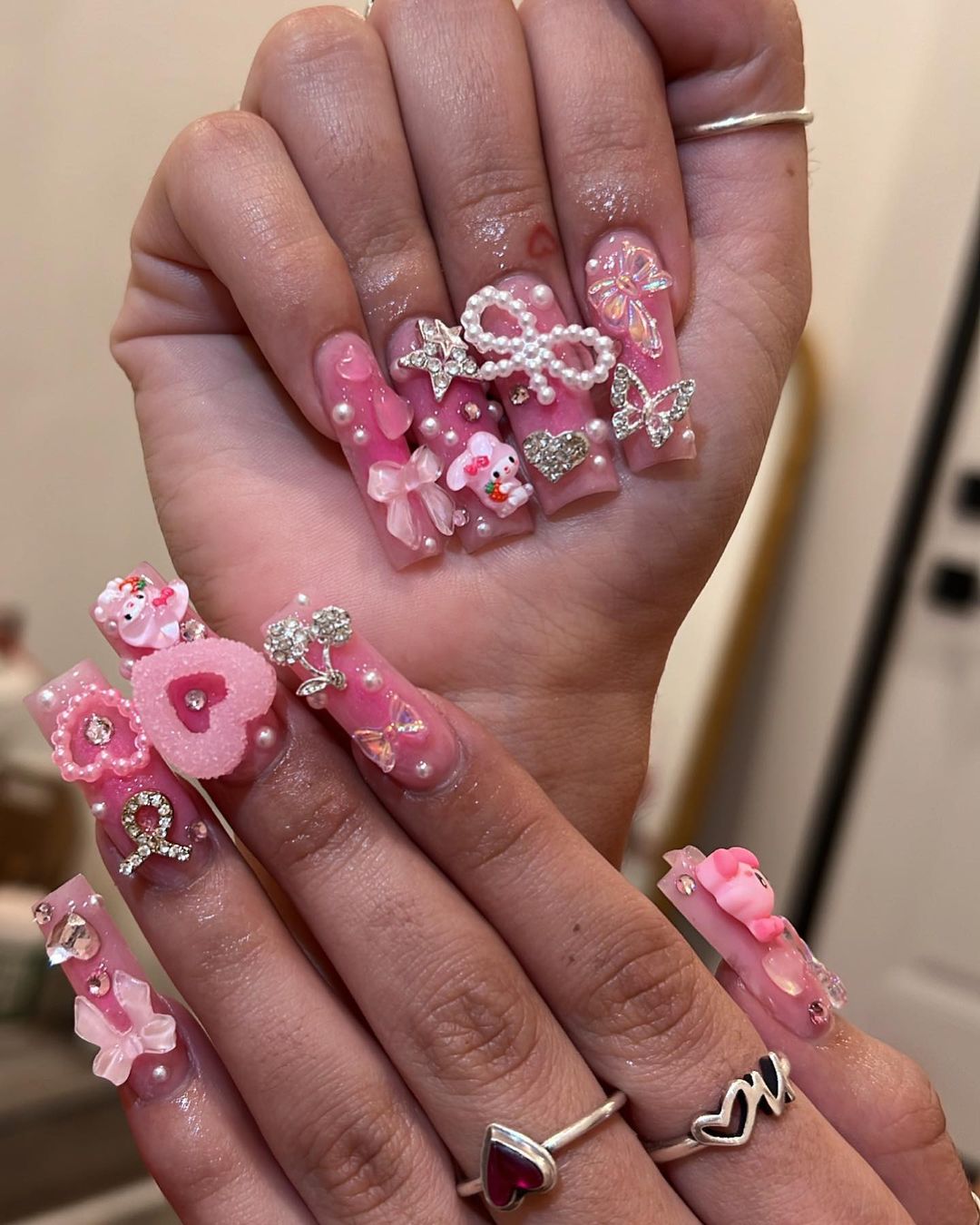 give me pink taurus nails