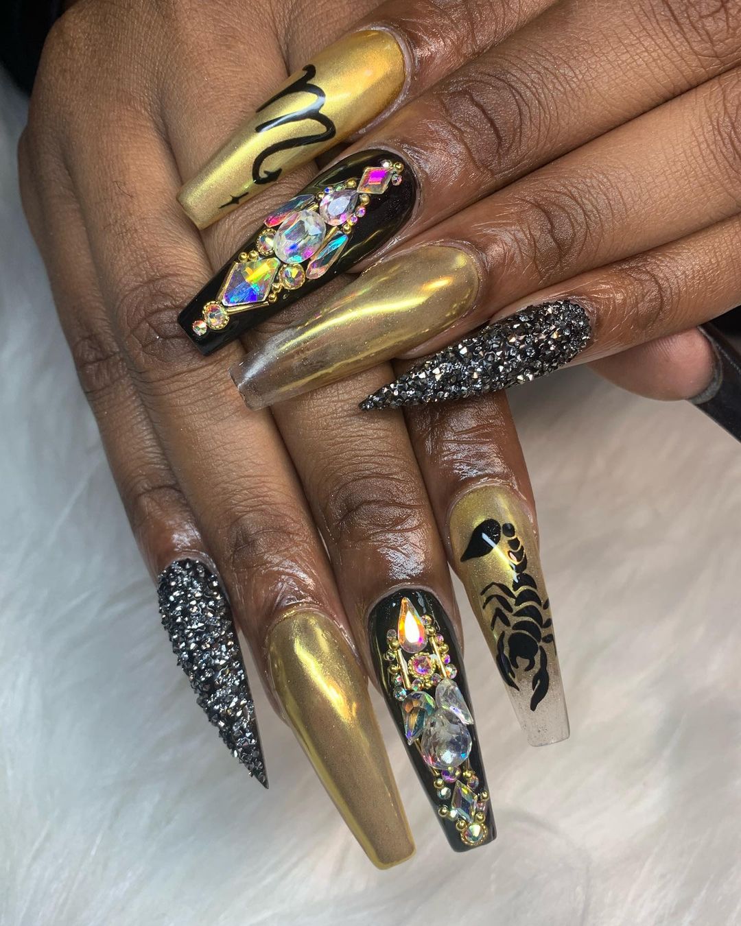 gold on throne scorpio nails