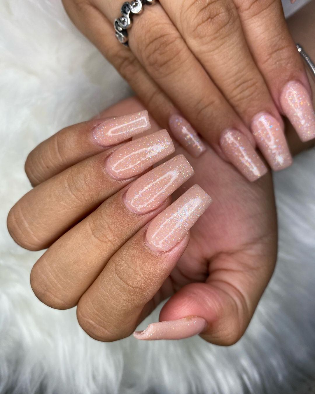 pink story nude glitter nails