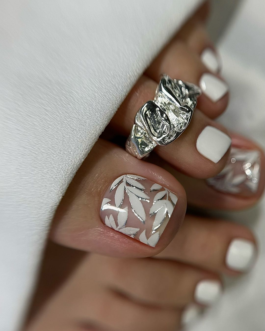 silver and white slider gel toenails