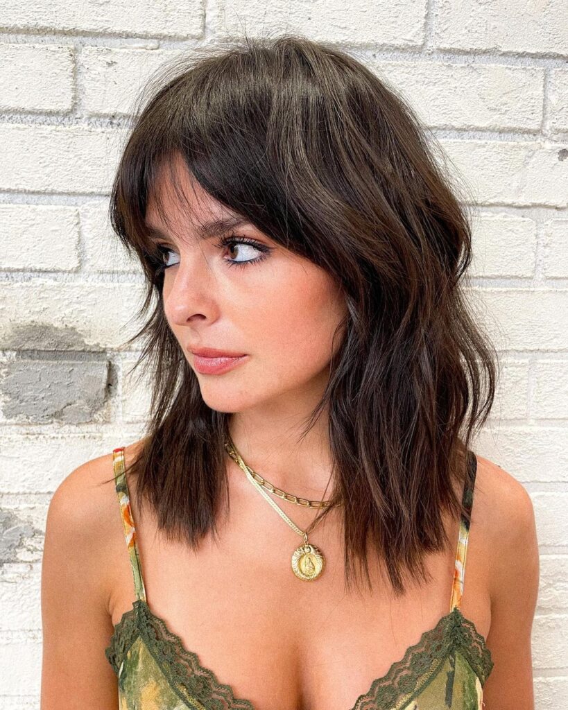 textured lob with curtain bangs