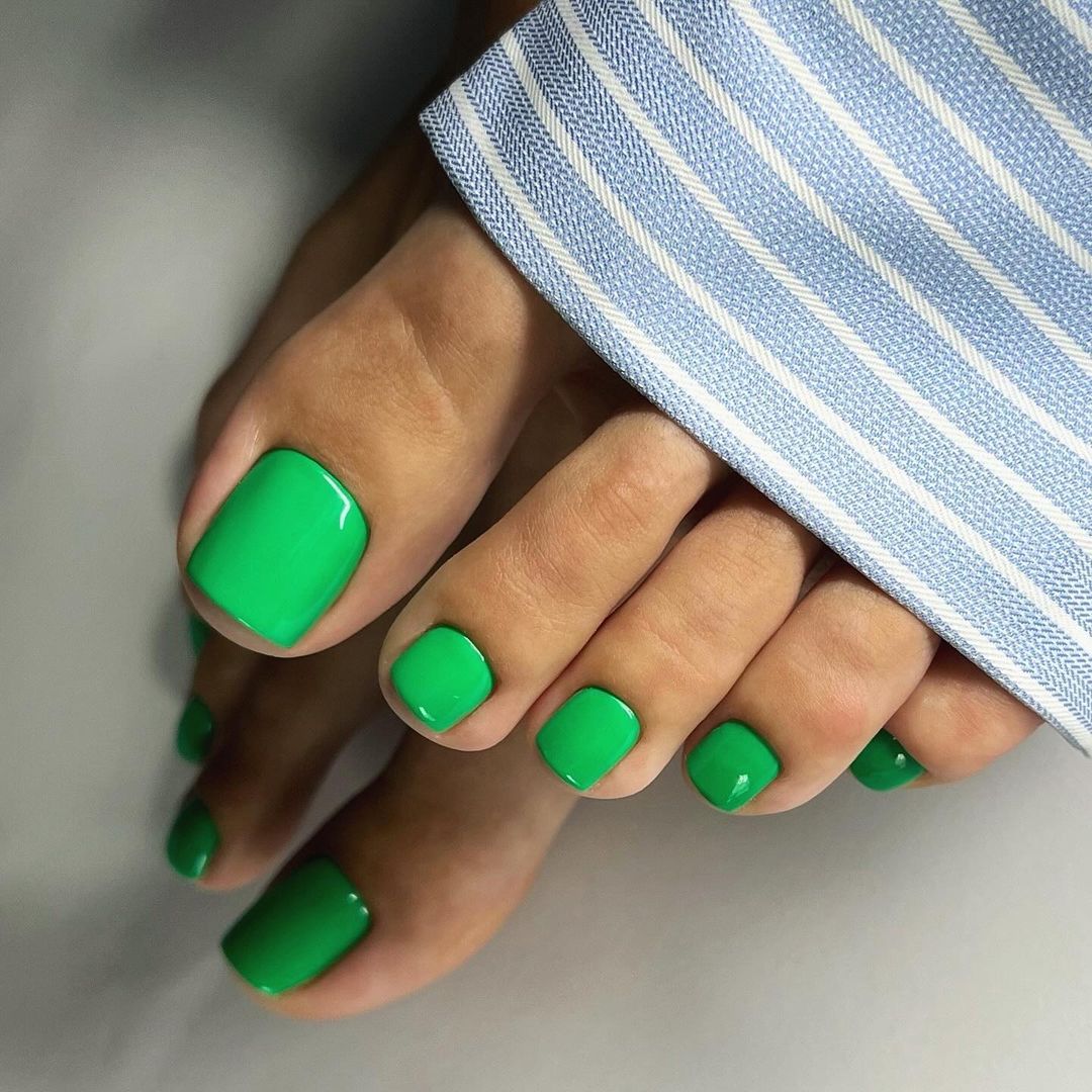 the scene is green fall-colored toenails