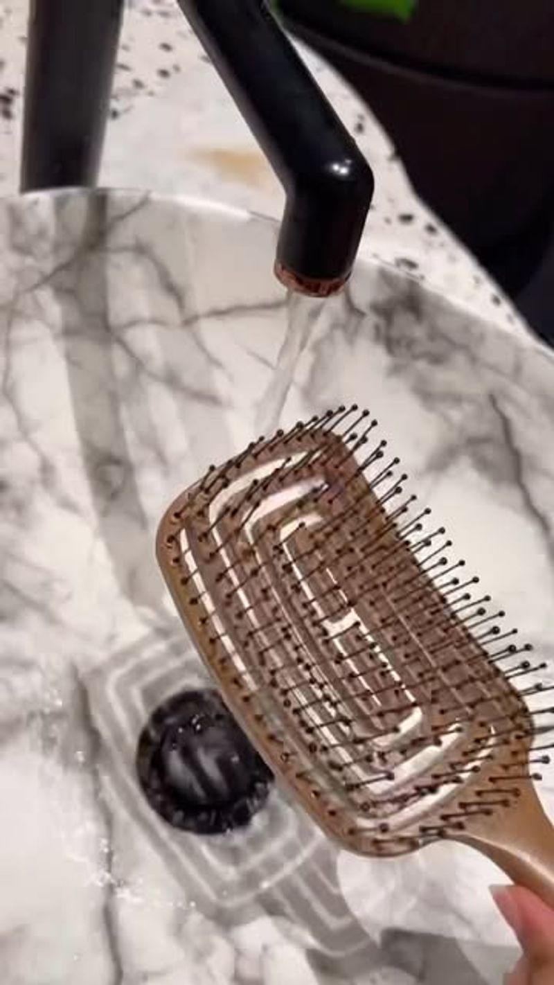 Neglecting Hairbrush Hygiene