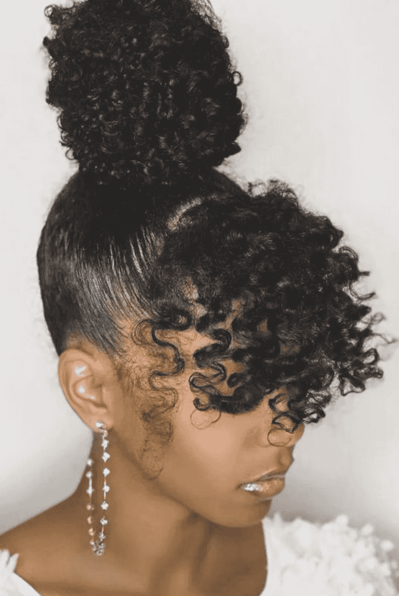Sculptural Updo With Natural Coils