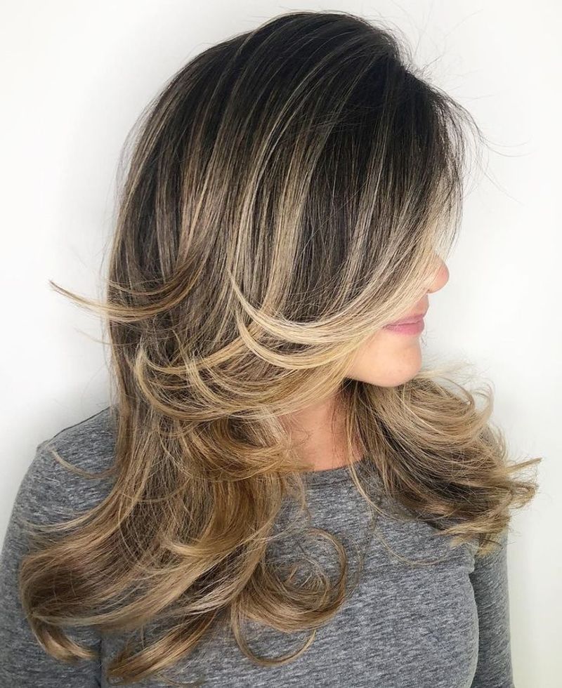 Long Layers With Side-Swept Bangs