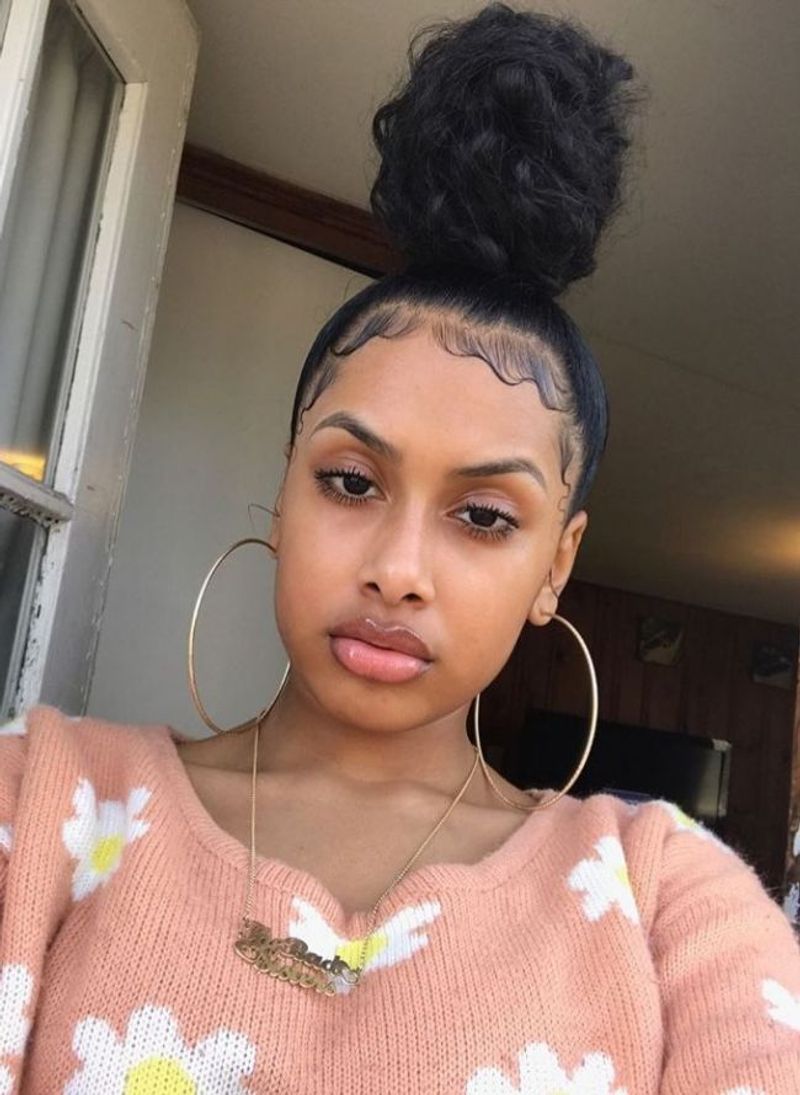 Textured Top Knot With Baby Hair Art
