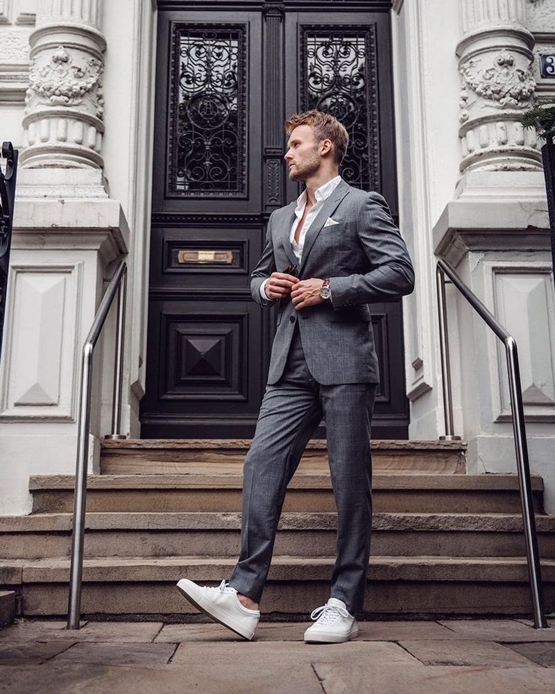 Pinstripe Suit with Bold Sneakers
