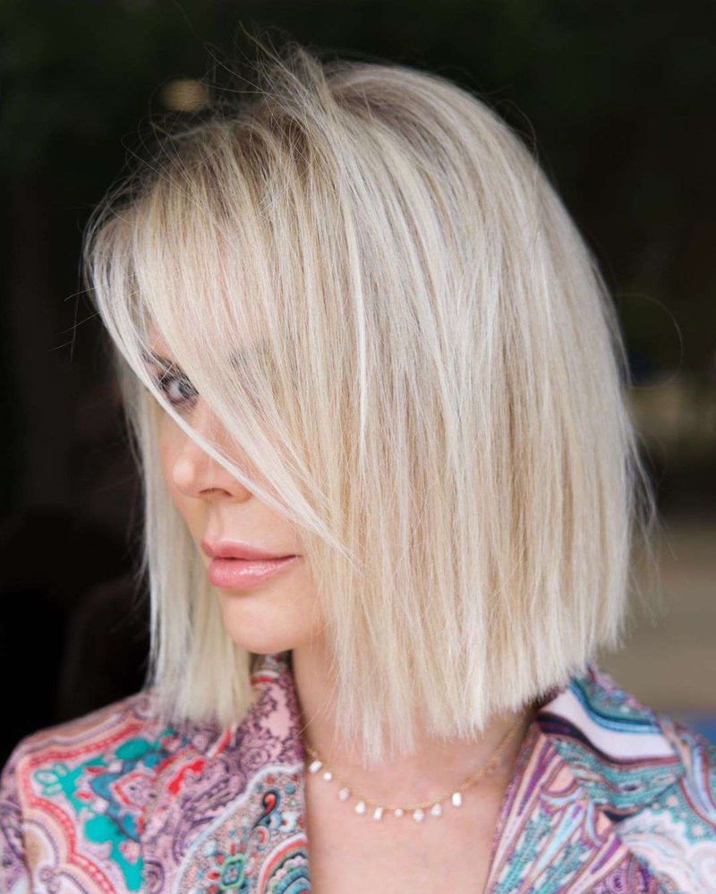 Soft Blunt Lob with Side-Swept Fringe