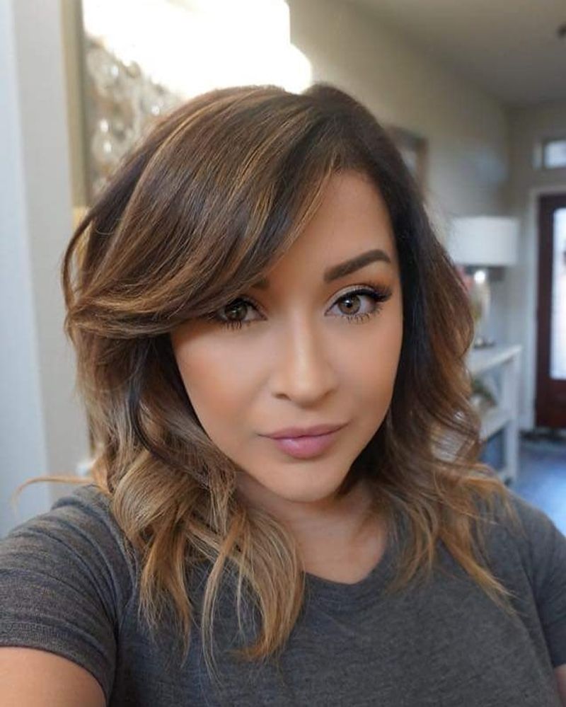 Heavy Side-Swept Bangs on Oblong Faces