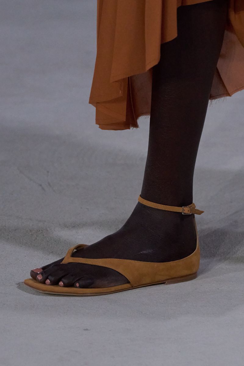 Ankle-Wrap Flats With Split-Hem Pants