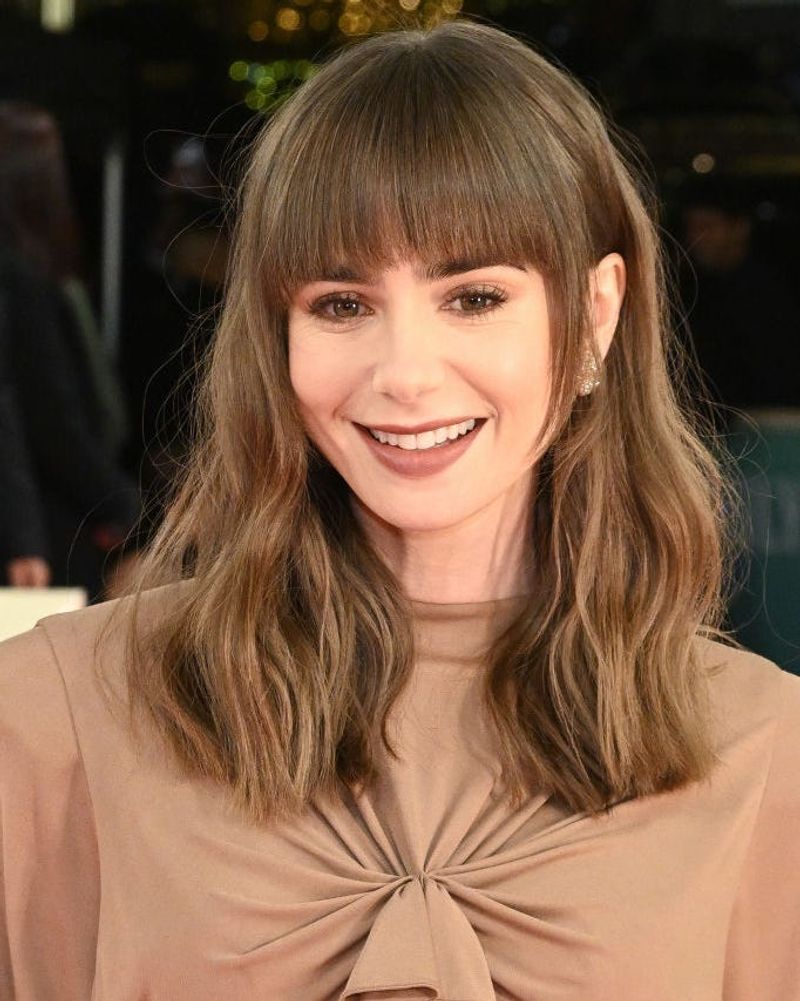 Brow-Grazing Bangs Balance Proportions