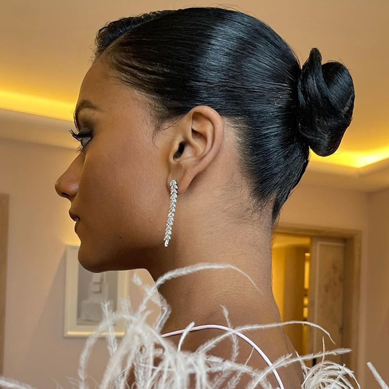 Sleek Center-Part Low Bun