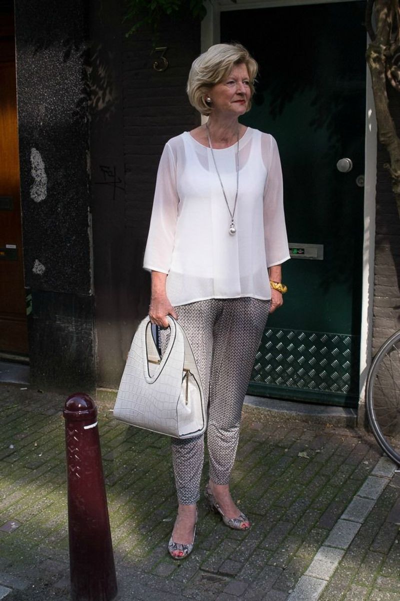 Cropped Pants with Tunic and Statement Jewelry