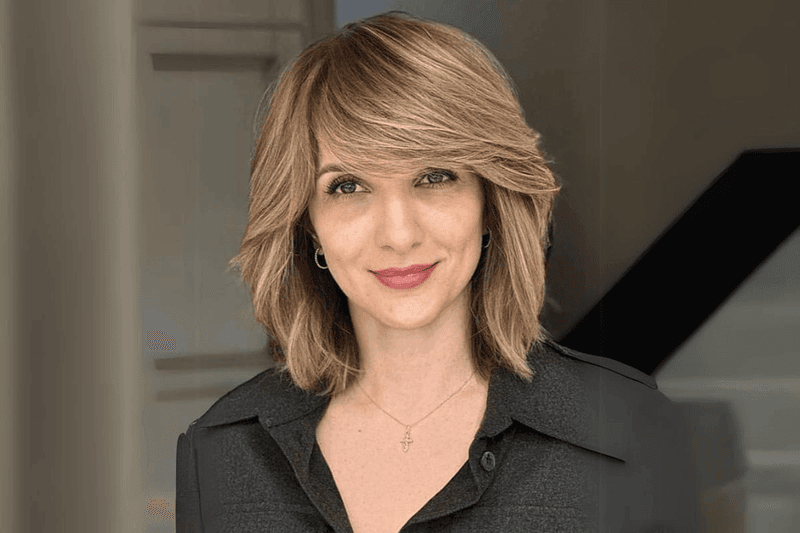 Layered Cut With Curved Bangs