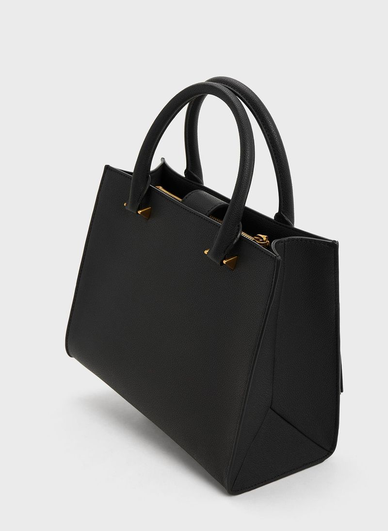 Structured Handbags In Contemporary Shapes