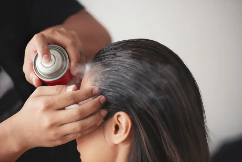 Excessive Hairspray Application