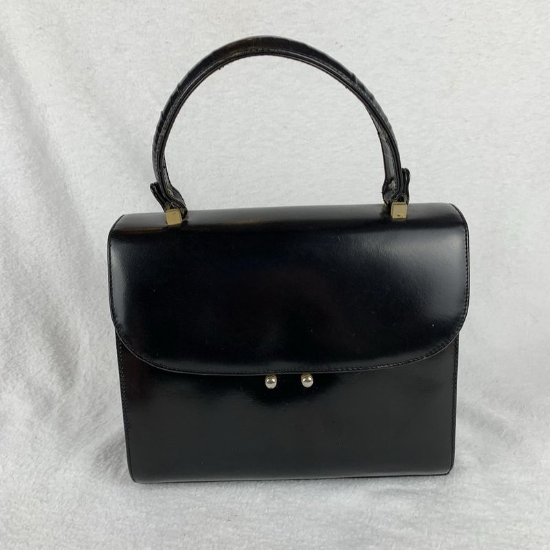Structured Handbags With Proper Clasps