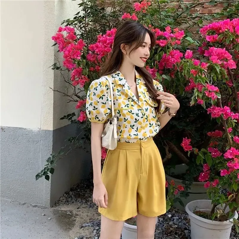 Puff-Sleeve Blouse and Paper Bag Waist Shorts